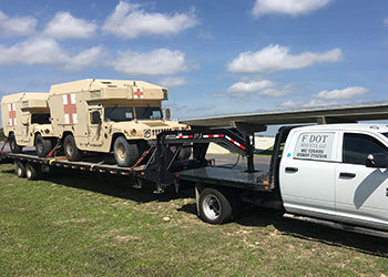 Do you need to transport vehicles from one place to another? F DOT Services can help with that.